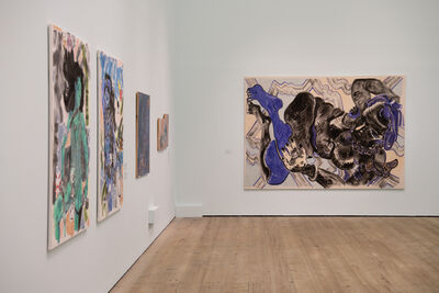 Three canvas abstract canvas paintings of women's bodies displayed on a white wall.