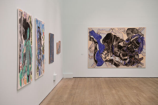 Three canvas abstract canvas paintings of women's bodies displayed on a white wall.