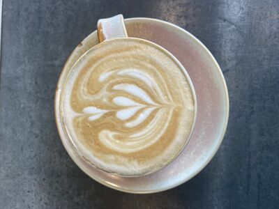 Coffee in a large pink mug.