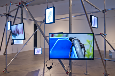 Scaffold with tv screens on