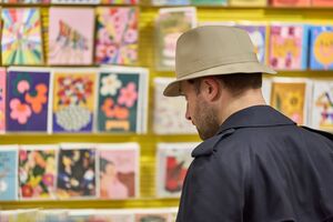 Person looking at greetings cards in Baltic shop