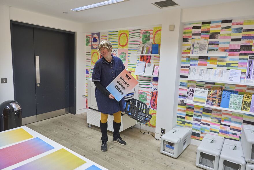 Person holding poster