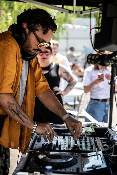 Person on DJ deck