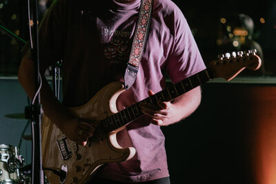 Figure playing guitar