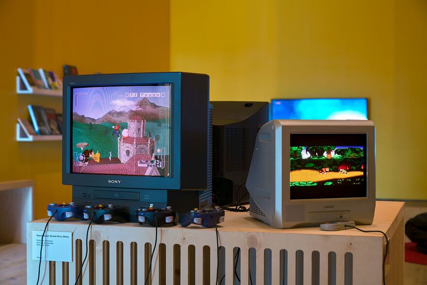 Retro games including Donkey Kong are set up on old 90s televisions in the Gaming Room.