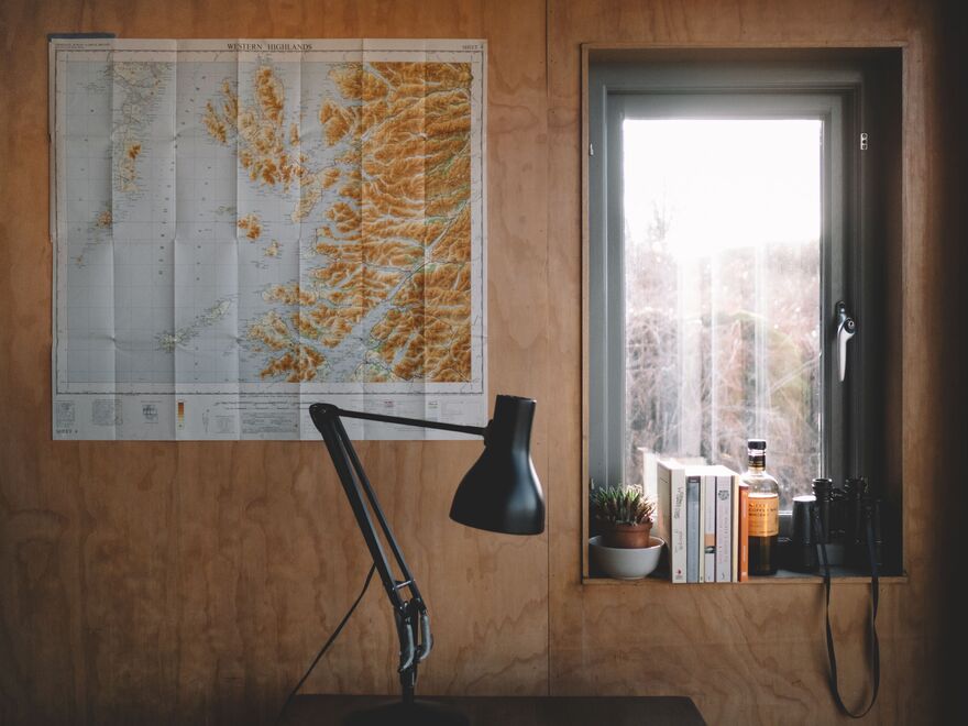 Artist Studio with map stuck on the wall