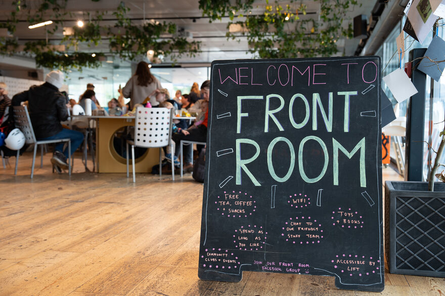 A chalkboard board that reads 'Welcome to Front Room'