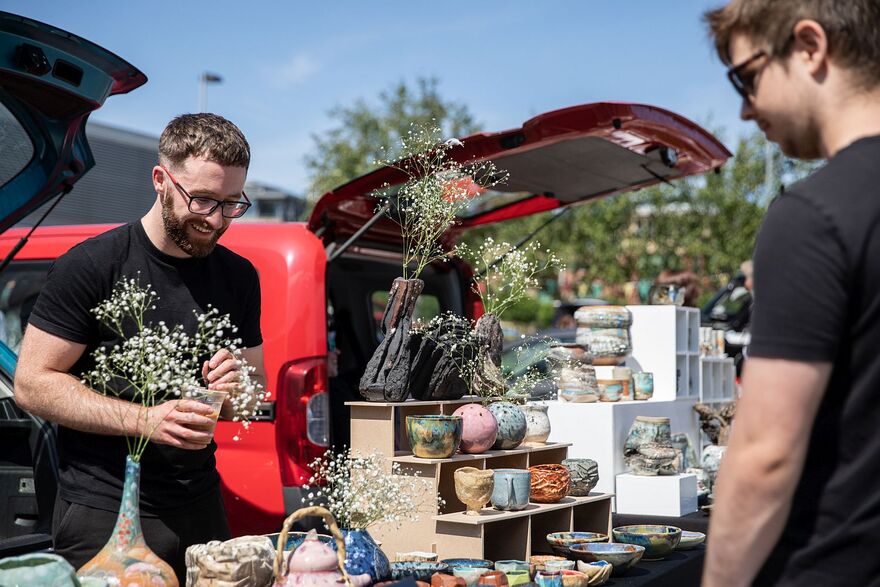 People shopping at the Art Car Boot Fair