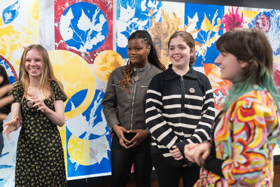 young people in front of their created lightbox artwork at Baltic