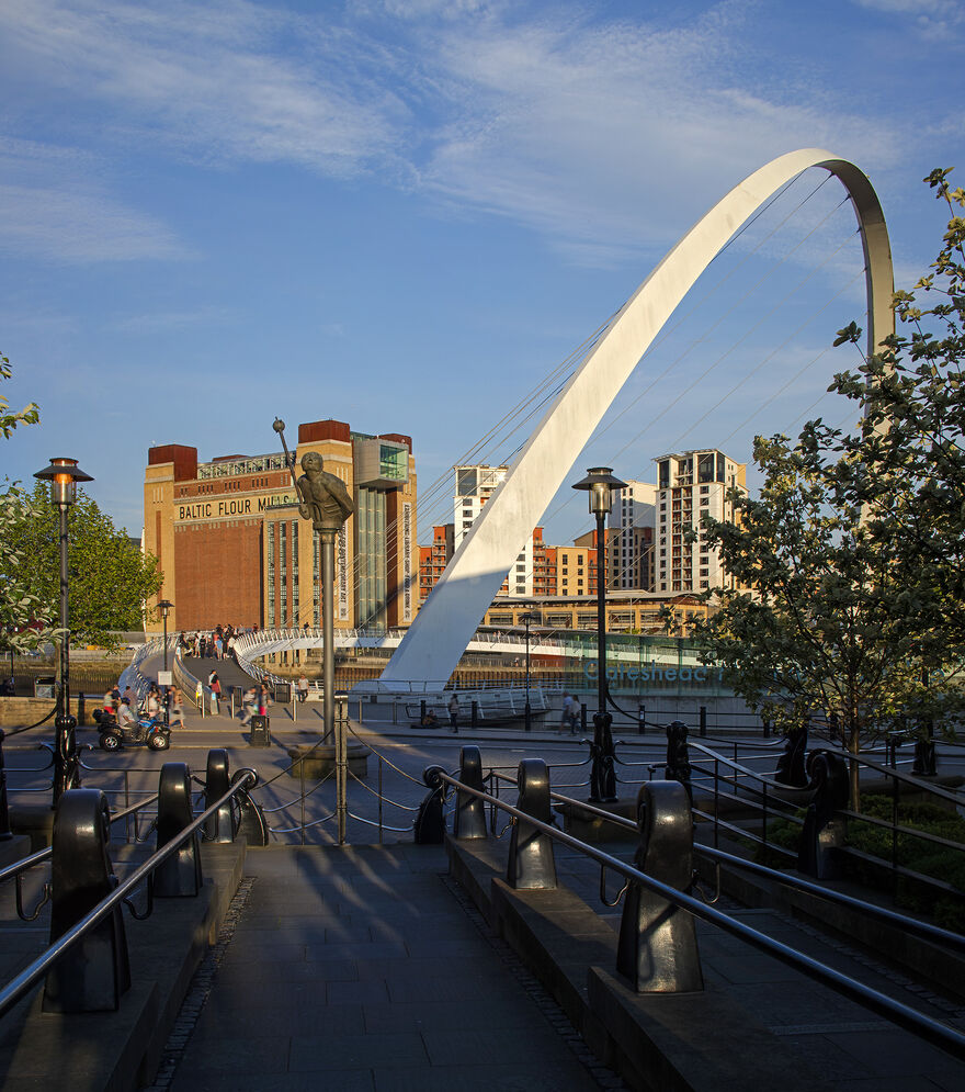 Path leading towards a bridge with Baltic Flour Mill in the background