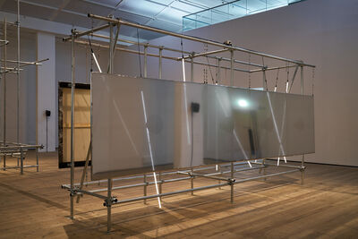 large metal panel in scaffolding