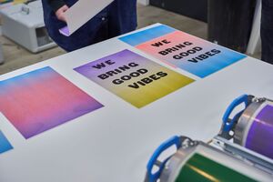 Colourful print saying 'We Bring Good Vibes'