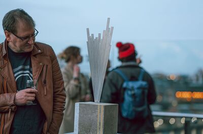 Person looking at sculpture