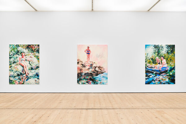 Three colourful paintings on a white wall